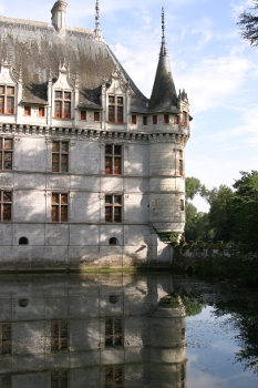 Chateaux reflected in lake